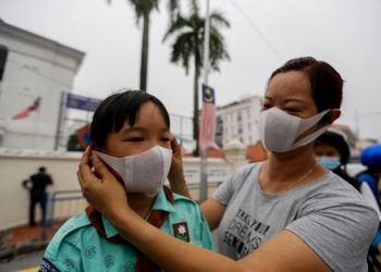 世卫组织：6岁以上孩童应该戴口罩