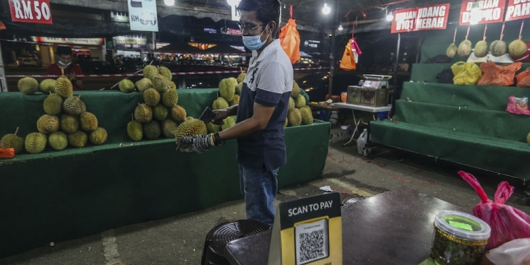 疫情下求存思变 大马商家适应无现金交易