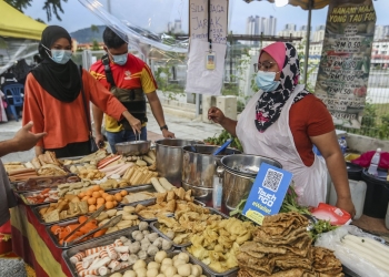 疫情下求存思变 大马商家适应无现金交易