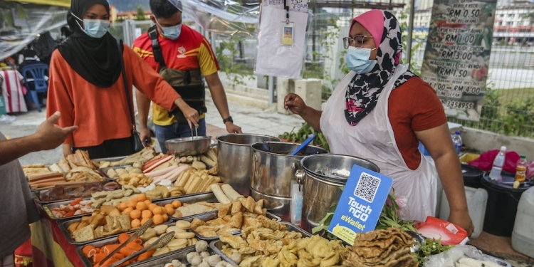 疫情下求存思变 大马商家适应无现金交易