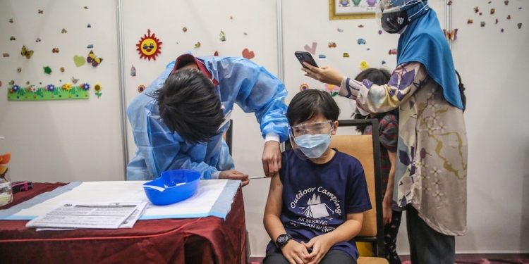 明起开放选择 5至11岁儿童可打科兴疫苗