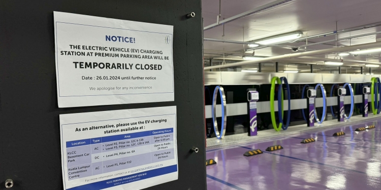 隆阳光广场高级泊车场电动车充电桩 暂停服务直至另行通知